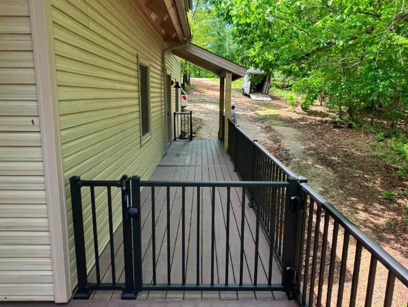 Armadillo composite deck with stairs and wood-grain finish — JHG Contracting LLC serving Gentry, AR