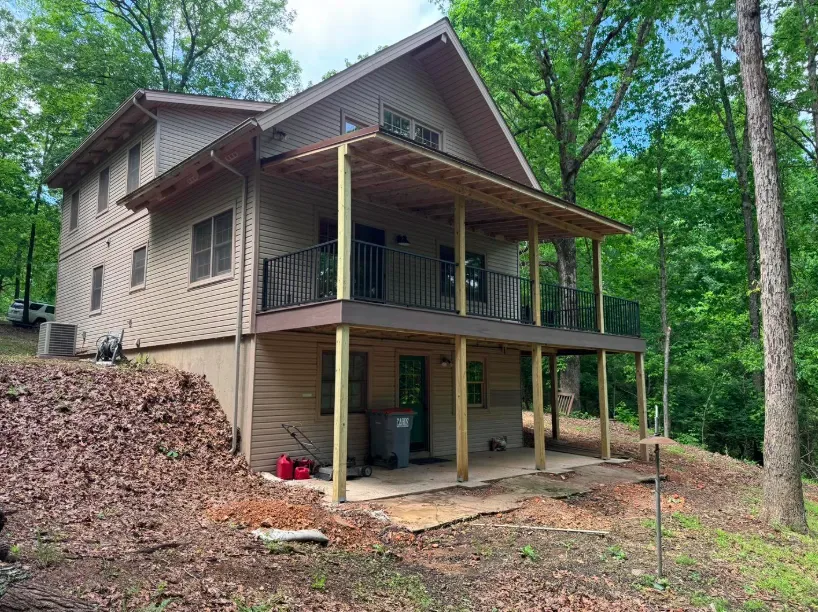 376 sq ft Armadillo composite deck with metal porch roof Fayetteville AR — JHG Contracting LLC