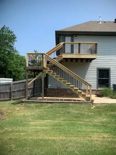 Second level deck with black balusters NWA Region — JHG Contracting LLC