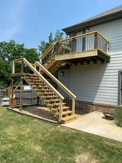 Second level custom deck with stairs and landing NWA — JHG Contracting LLC