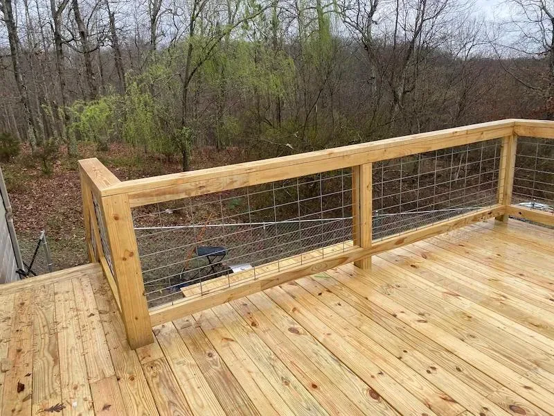Custom wood deck with cable balusters NWA Region — JHG Contracting LLC