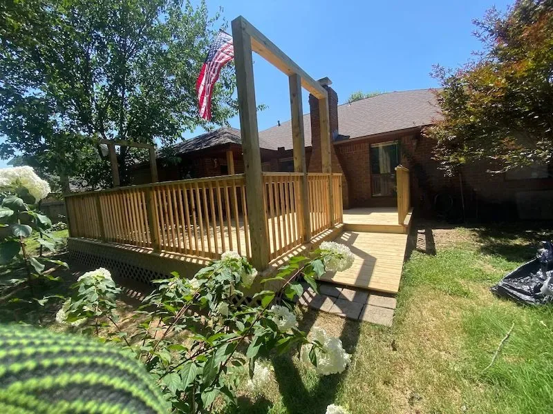 Custom wood deck matching railings — JHG Contracting LLC serving Gentry, AR