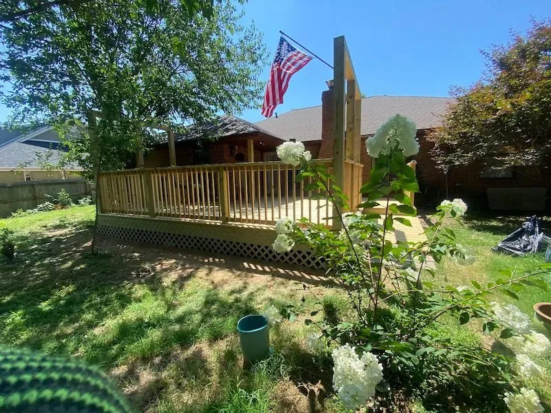 Wood deck with matching balusters — JHG Contracting LLC serving Gravette, AR